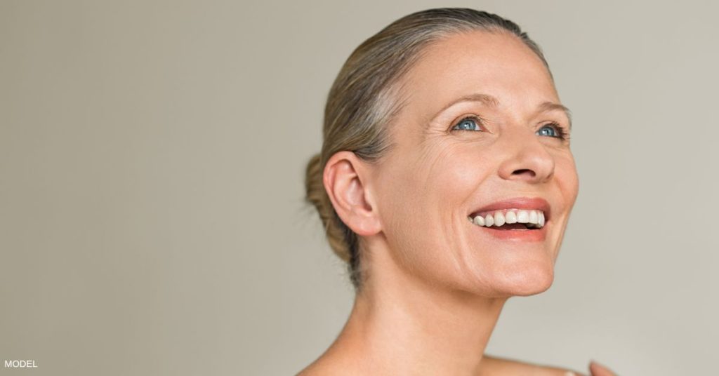 An older woman looking off into the distance (model)